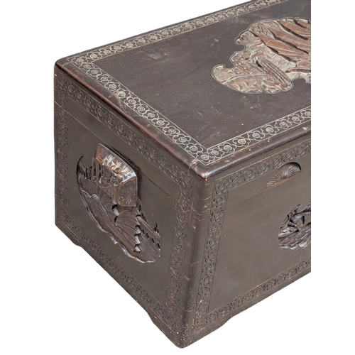 673 - A 1930s Chinese camphorwood trunk. 96x47x45cm. 11