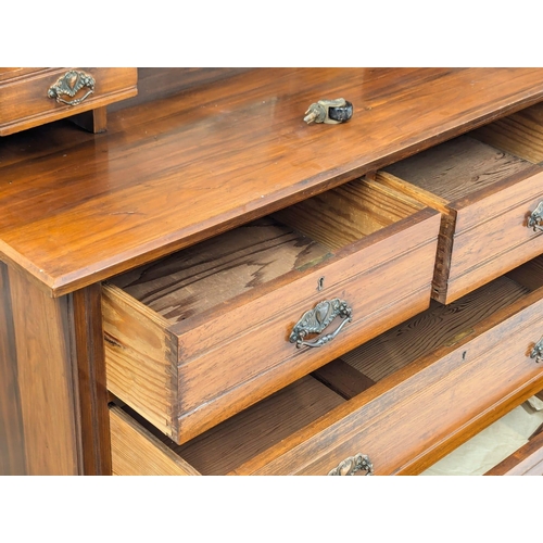 683 - A Late Victorian walnut dressing chest. Circa 1900. 107x45x151cm (2)