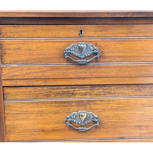 683 - A Late Victorian walnut dressing chest. Circa 1900. 107x45x151cm (2)