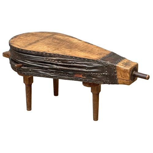 685 - A large Late 19th Century Blacksmith's bellows coffee table. 123x59x49cm. 10