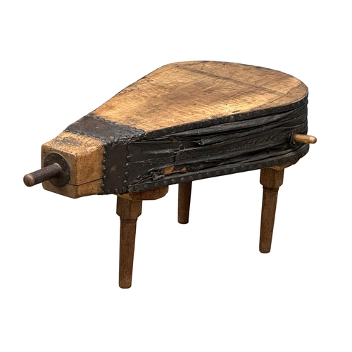 685 - A large Late 19th Century Blacksmith's bellows coffee table. 123x59x49cm. 10