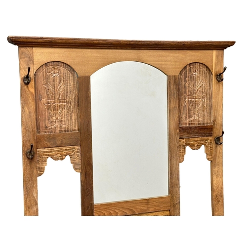 686 - A Late 19th Century walnut, mirror back hallstand. Circa 1890. 103x33x190cm (1)