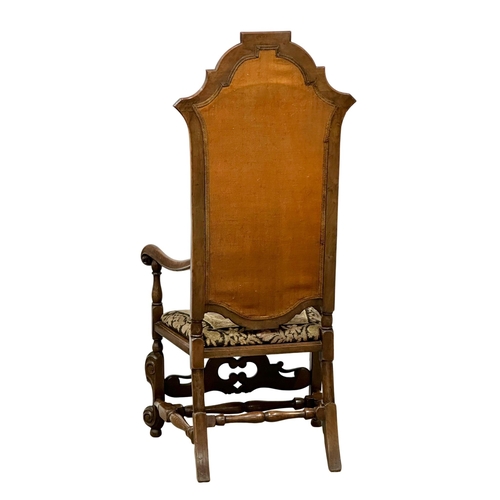 687 - A large Late 19th Century Carolinian style walnut armchair, with original tapestry back and seat. Ci... 