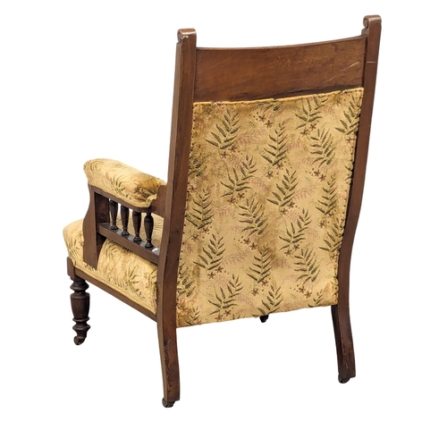 690 - A Late 19th Century Victorian walnut armchair. (1)