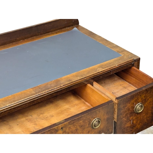 694 - A 1930s walnut writing desk. 110x51x84cm. 3