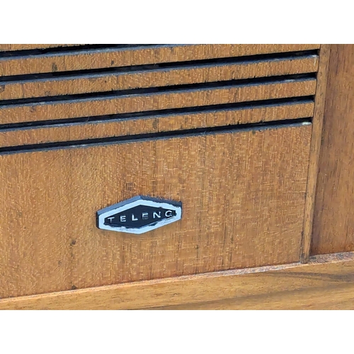 709 - A Mid Century teak radiogram. 128x38.5x61.5cm. 3