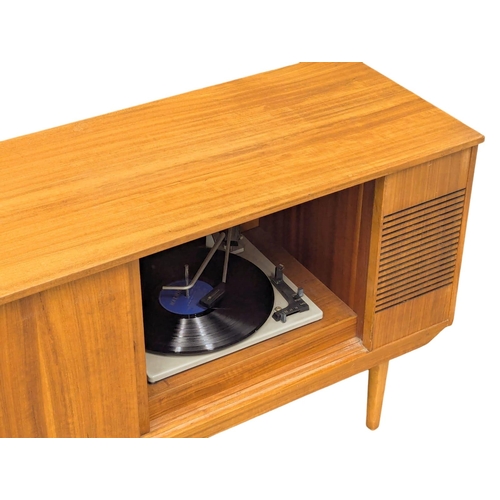 709 - A Mid Century teak radiogram. 128x38.5x61.5cm. 3