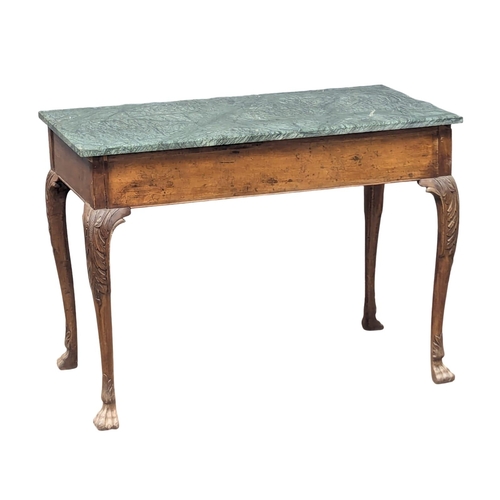 72 - A Late 18th Century mahogany side table raised on four lion paw feet with later marble top. George I... 