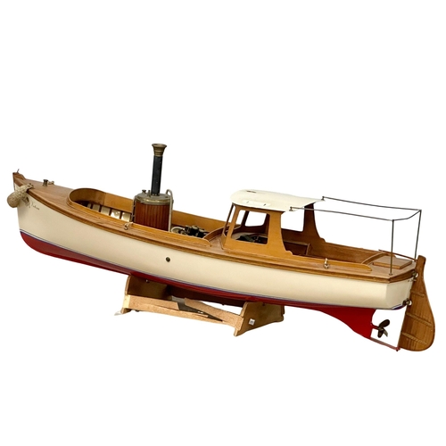 767 - 2 large motorised boats. A Victorian style steamboat and a yacht. 128cm. 106cm