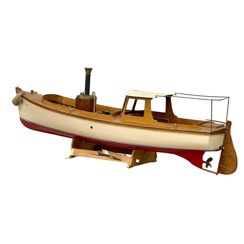 767 - 2 large motorised boats. A Victorian style steamboat and a yacht. 128cm. 106cm