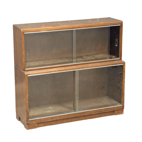 787 - A Minty oak stacking bookcase. 89x29x81cm (2)