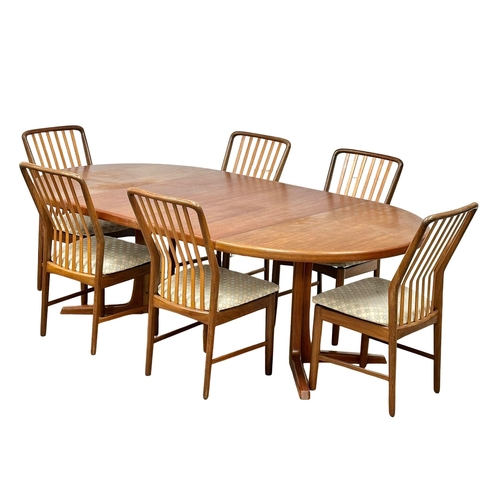 9 - Svend Aage Madsen. A good quality Danish Mid Century teak extending, 2 leaf dining table and 6 chair... 