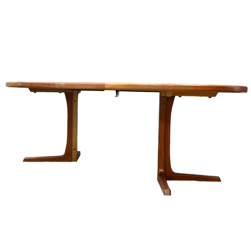 9 - Svend Aage Madsen. A good quality Danish Mid Century teak extending, 2 leaf dining table and 6 chair... 