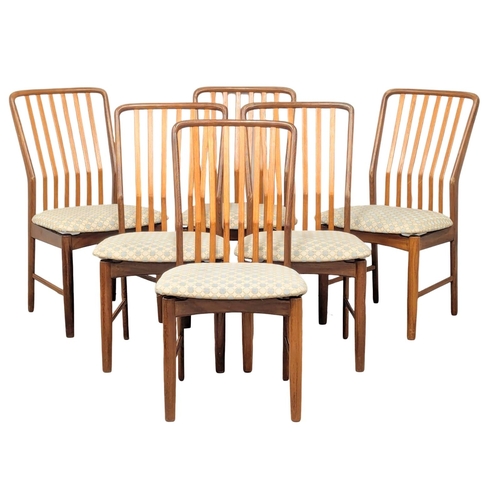 9 - Svend Aage Madsen. A good quality Danish Mid Century teak extending, 2 leaf dining table and 6 chair... 