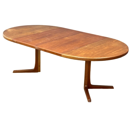 9 - Svend Aage Madsen. A good quality Danish Mid Century teak extending, 2 leaf dining table and 6 chair... 