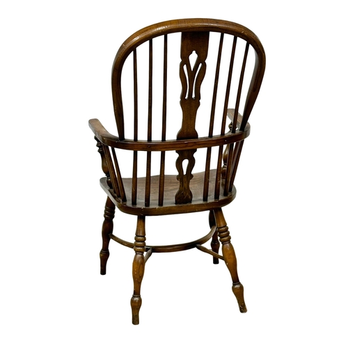 91 - A Late 19th Century elm Windsor chair.