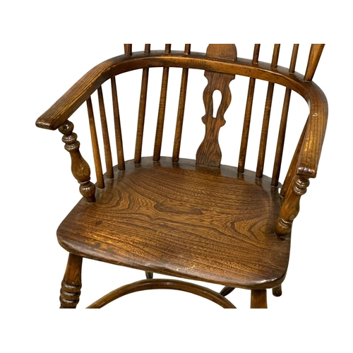 91 - A Late 19th Century elm Windsor chair.