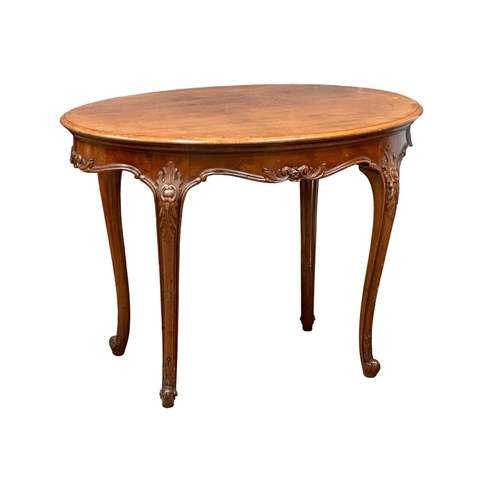 918 - An Early 20th Century French mahogany centre table, on cabriole legs. 102x68x74cm (11)