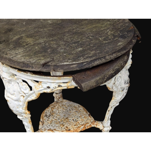 931 - A 19th Century Victorian cast iron garden table. 62x79cm. 1