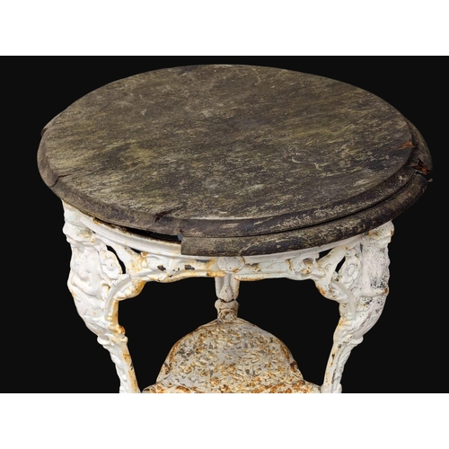 931 - A 19th Century Victorian cast iron garden table. 62x79cm. 1