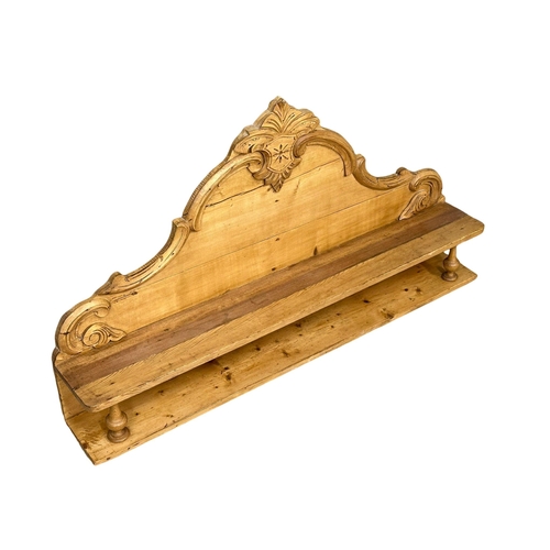 938 - A Victorian pine wall shelf. 122x68cm (6)