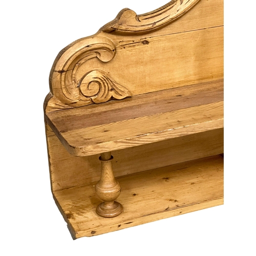 938 - A Victorian pine wall shelf. 122x68cm (6)