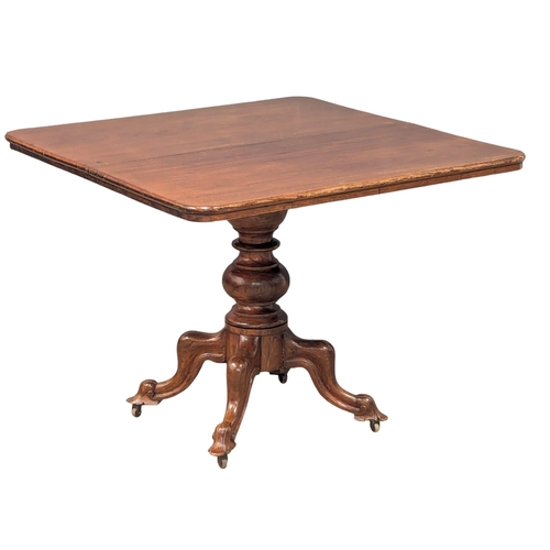 944 - A 19th Century scratch made mahogany pedestal centre table. 88x89x68cm (1)