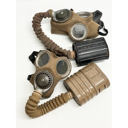 739 - Two WWII gas masks. Barringer Wallis. Dated 1939