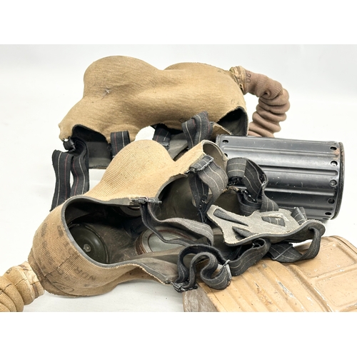 739 - Two WWII gas masks. Barringer Wallis. Dated 1939