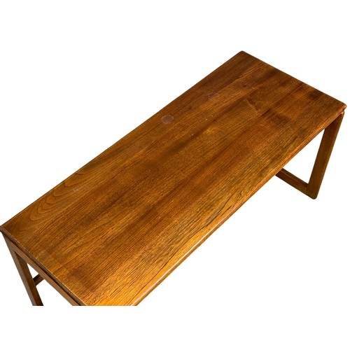 96 - A Danish style Mid Century teak coffee table with 2 nesting tables. 103x43x48cm (1)