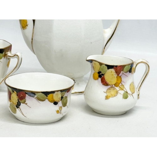 297 - A 1920’s Royal Doulton “Honesty” Art Deco part coffee service.