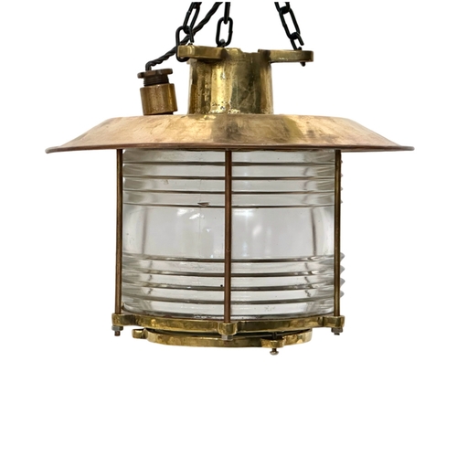 298 - A large Early 20th Century Ships Lantern Nautical brass ceiling light. Lantern measures 37x32cm.