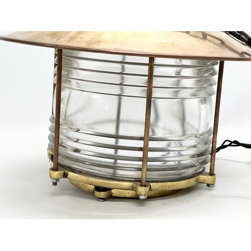 298 - A large Early 20th Century Ships Lantern Nautical brass ceiling light. Lantern measures 37x32cm.