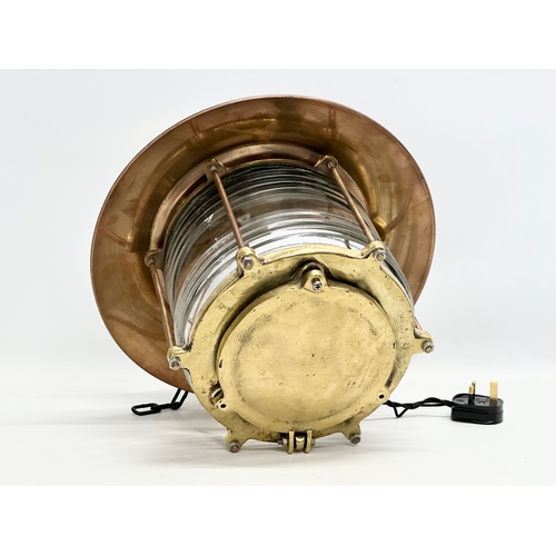 298 - A large Early 20th Century Ships Lantern Nautical brass ceiling light. Lantern measures 37x32cm.