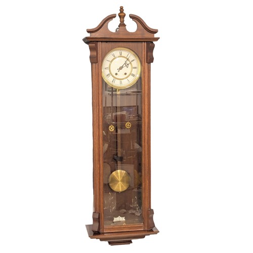 454 - A large Victorian style Vienna wall clock with double weights and pendulum. 120cm