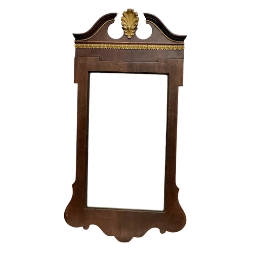 302 - An Early 20th Century French Empire style mahogany framed mirror. 52x107cm