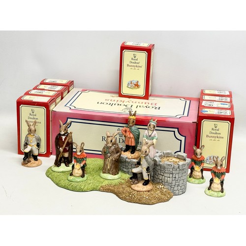 862 - Robin Hood Collection. A Royal Doulton Bunnykins “The Robin Hood Collection” 9 figurines and base. A... 