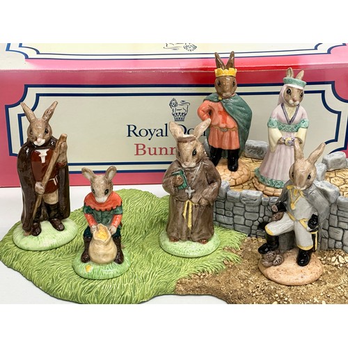 862 - Robin Hood Collection. A Royal Doulton Bunnykins “The Robin Hood Collection” 9 figurines and base. A... 