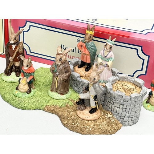 862 - Robin Hood Collection. A Royal Doulton Bunnykins “The Robin Hood Collection” 9 figurines and base. A... 