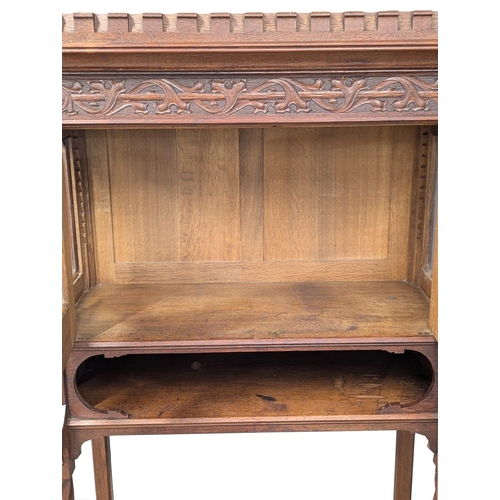 920A - A Late 19th Century oak court cabinet. 102x48.5x171cm. 9