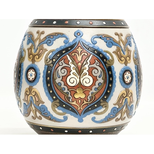 131 - Villeroy & Boch. A Late 19th Century German earthenware Mettlach vase with embossed Islamic style de... 