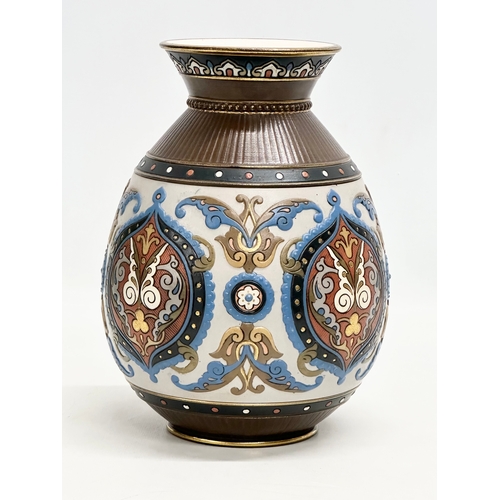 131 - Villeroy & Boch. A Late 19th Century German earthenware Mettlach vase with embossed Islamic style de... 