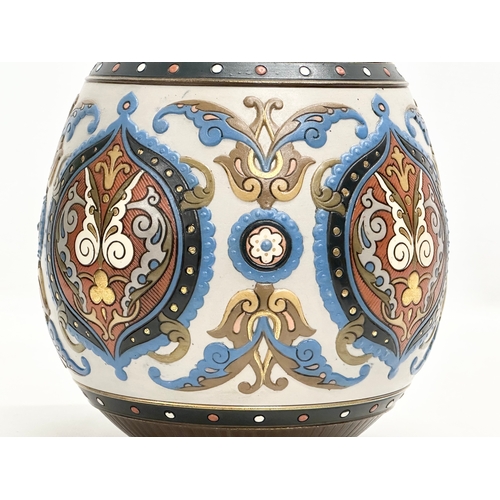 131 - Villeroy & Boch. A Late 19th Century German earthenware Mettlach vase with embossed Islamic style de... 