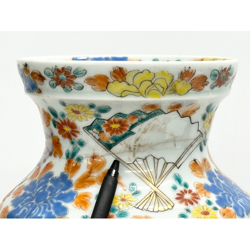 132 - An Early/Mid 20th Century Japanese hand painted vase. With wildflower, immortals and flying crane de... 