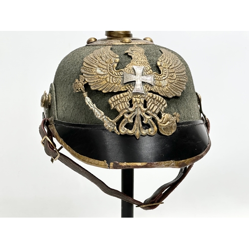 176 - A reproduction WWI German Picklehaube helmet.