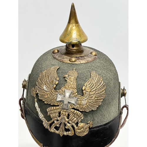 176 - A reproduction WWI German Picklehaube helmet.