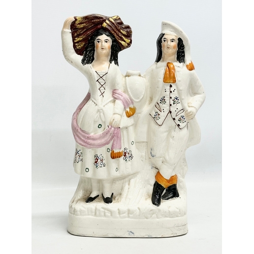 134 - A pair of 19th Century Victorian Staffordshire Pottery “Highland Harvest” figurines. Harvest Couple.... 