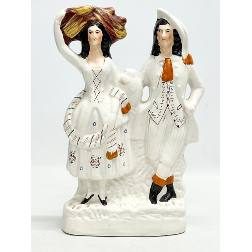 134 - A pair of 19th Century Victorian Staffordshire Pottery “Highland Harvest” figurines. Harvest Couple.... 