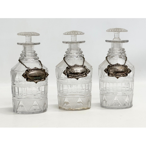 77 - A 19th Century Victorian 3 glass decanter set on stand. With 3 rings and silver plated labels. Whisk... 