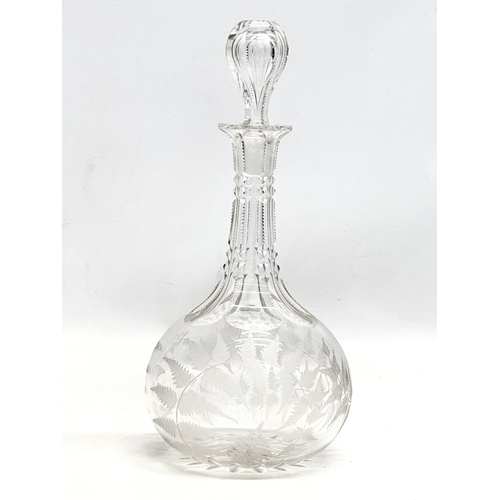 76 - A set of 4 matching Late 19th Century Victorian glass decanters, with notch cut and etched fern desi... 